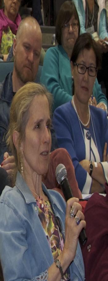 Susan Crate, Professor at George Mason University, poses a question to members of the discussion panel entitled, &#39;Arctic Futures, Sustainabilities and Strategic Environmental Research.&#39; Photo courtesy of Alona Yefimenko.