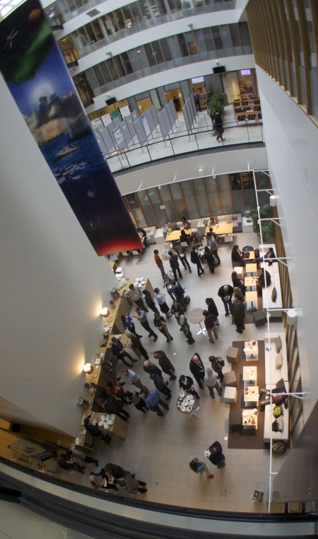 Attendees enjoy coffee break during Arctic Observing Summit. Photo courtesy of Mikko Strahlendorff.